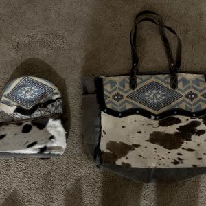 Myra bags, brand new with tags. Never used. Smoke free, pet free home.